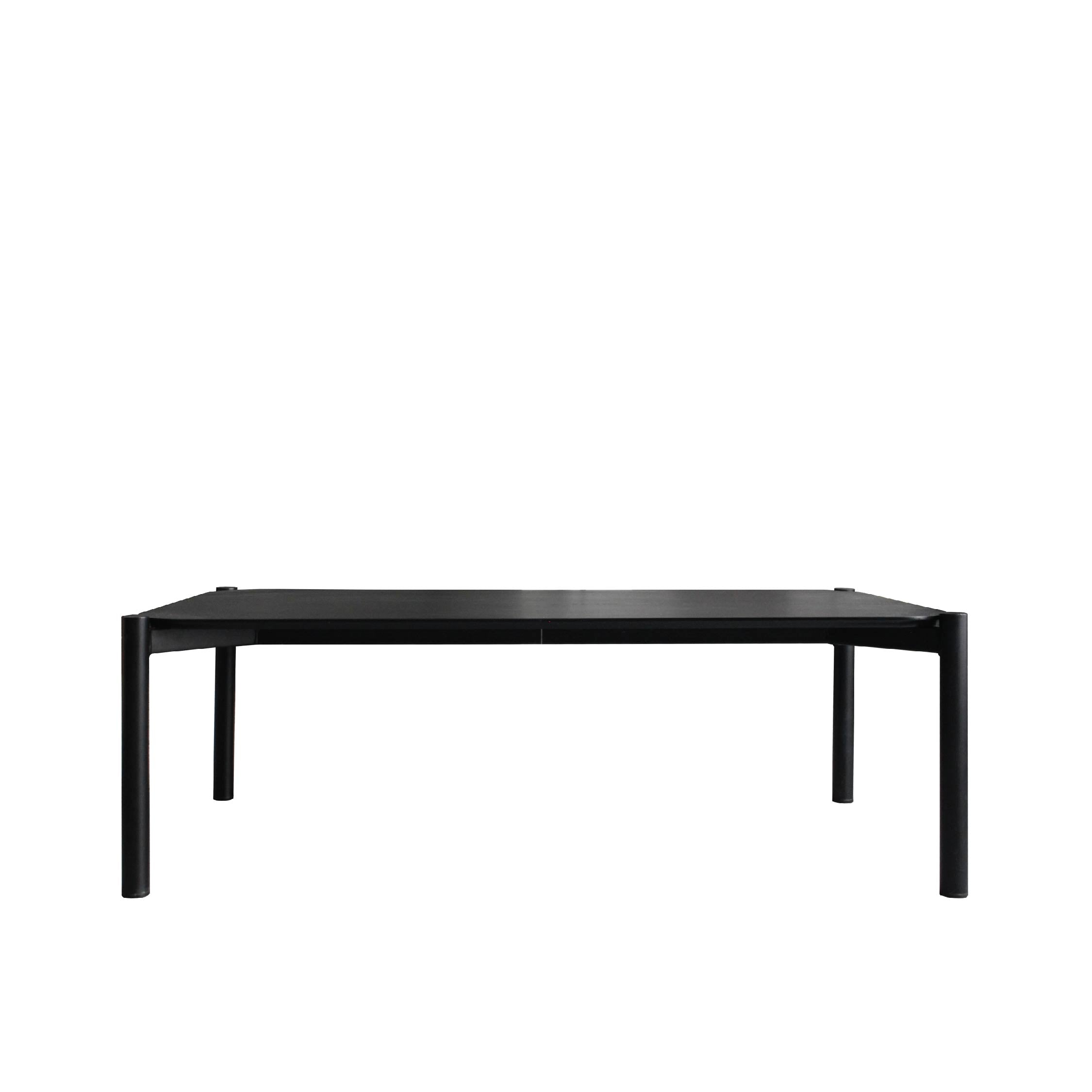 A rectangular black coffee table with a wood grain appearance on the tabletop and metal legs with black powder coated paint.
