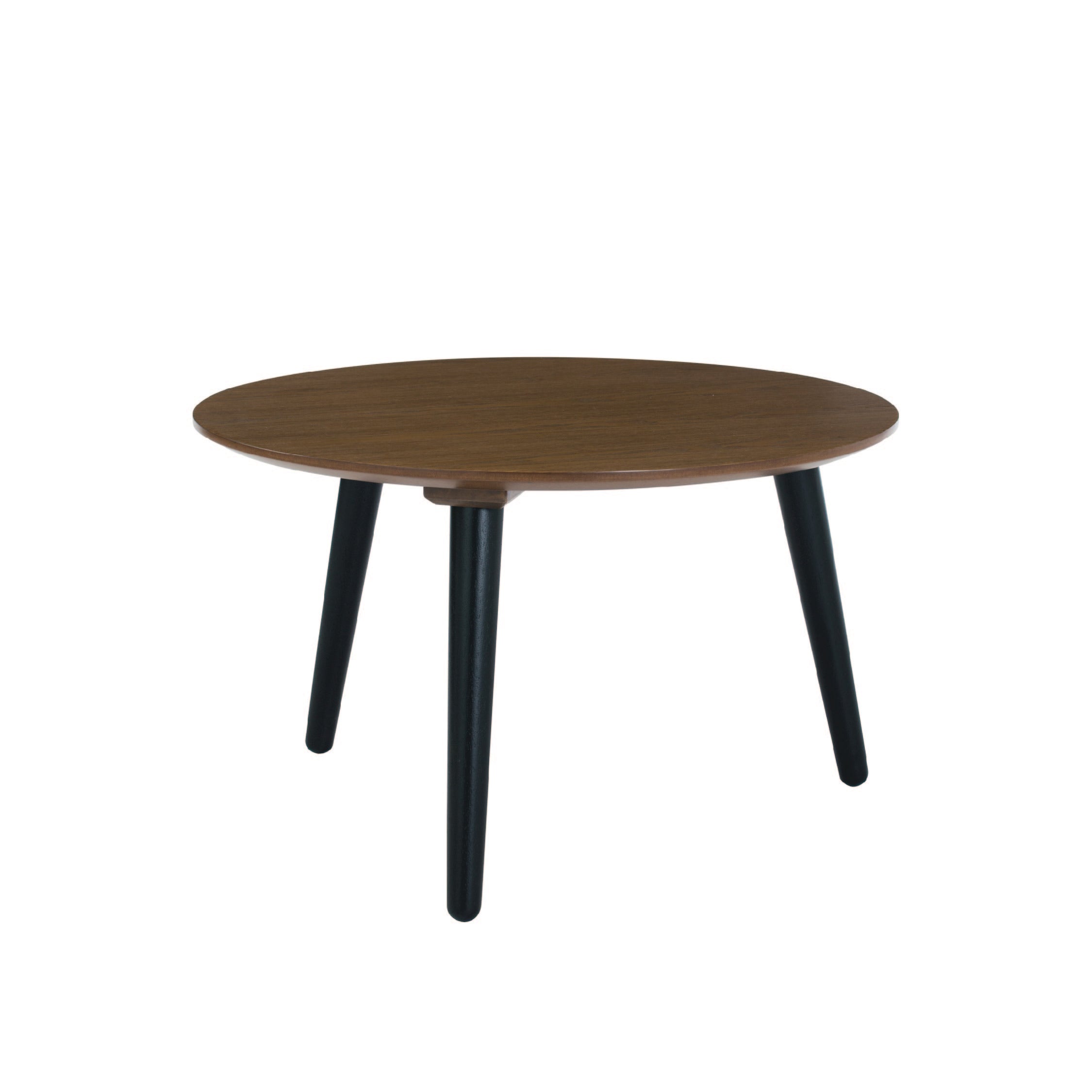 A round brown coffee table with black legs, flat-packed for assembly.