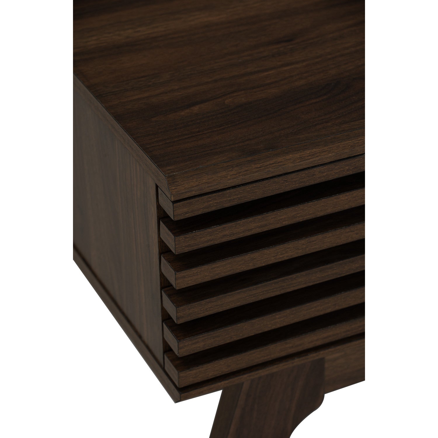 Close-up of a dark brown wooden furniture piece showing the wood grain texture, layered drawer fronts, and a curved leg on a white background.