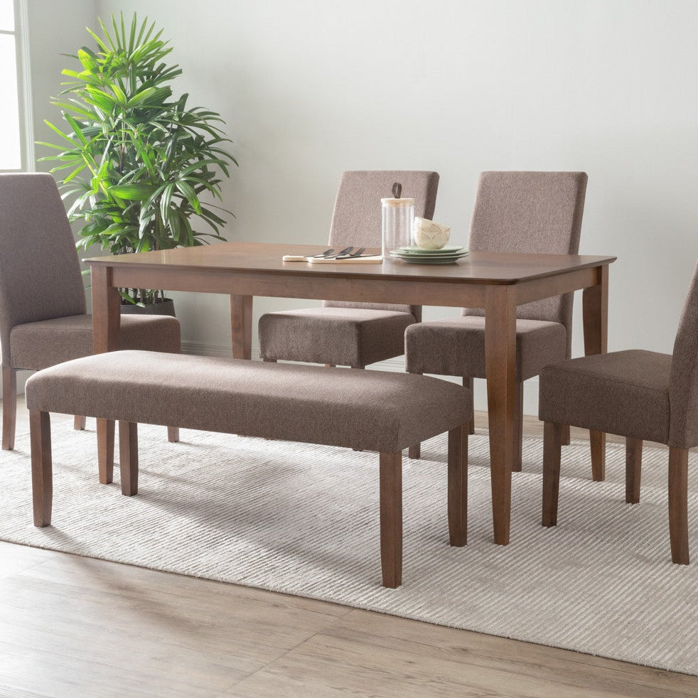 Dining room set with a table and chairs in a well-lit room.