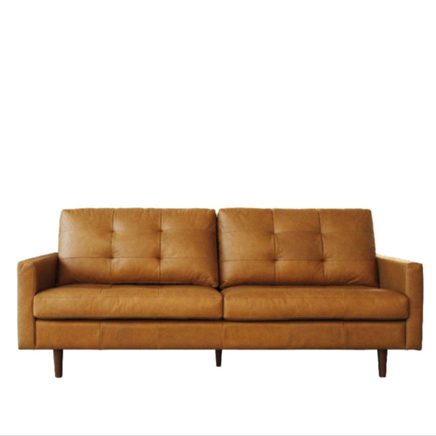 A brown 3-seater leather sofa with a sleek contemporary design, featuring button tufting on the backrest and placed on a plain background.