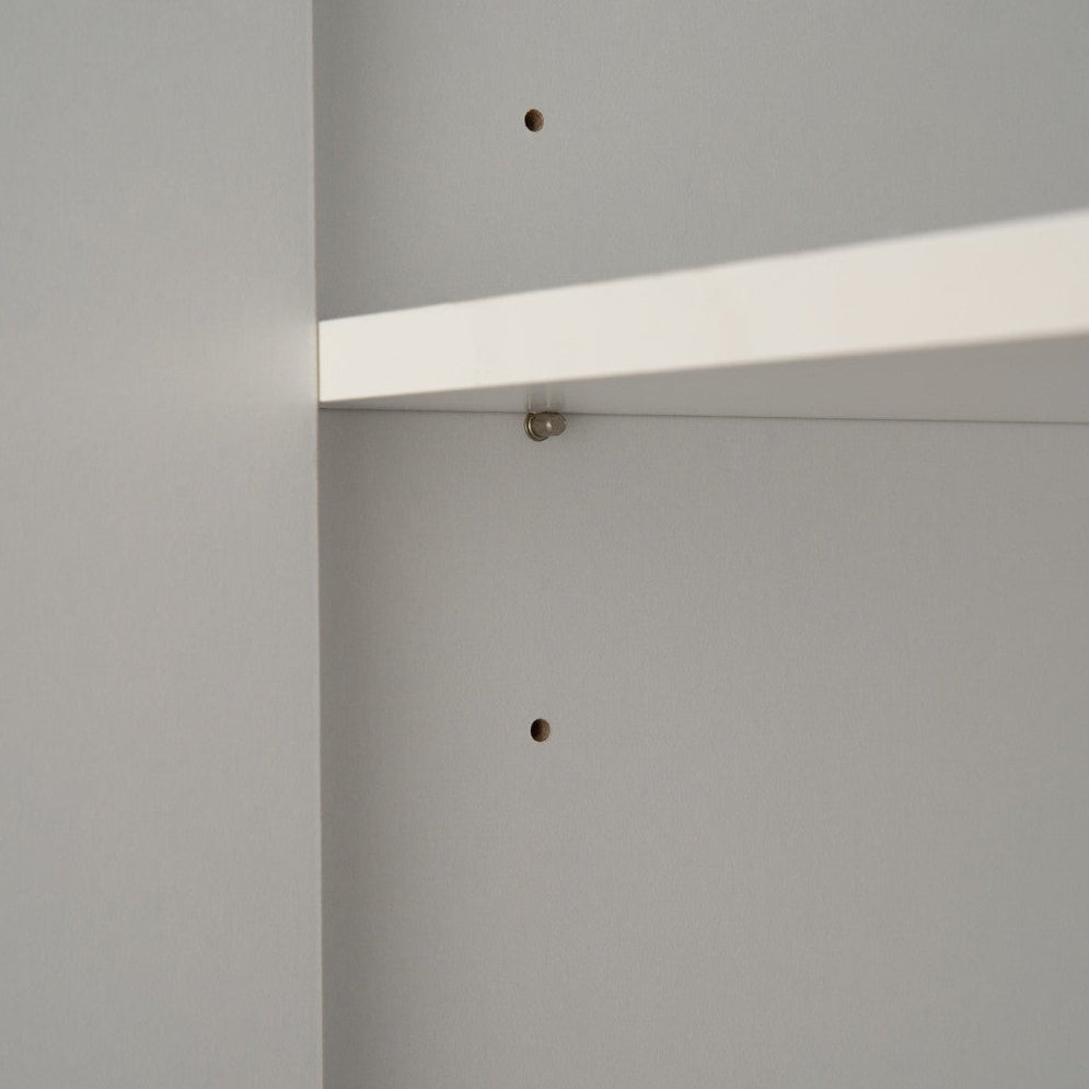 Gray wall with a white horizontal strip