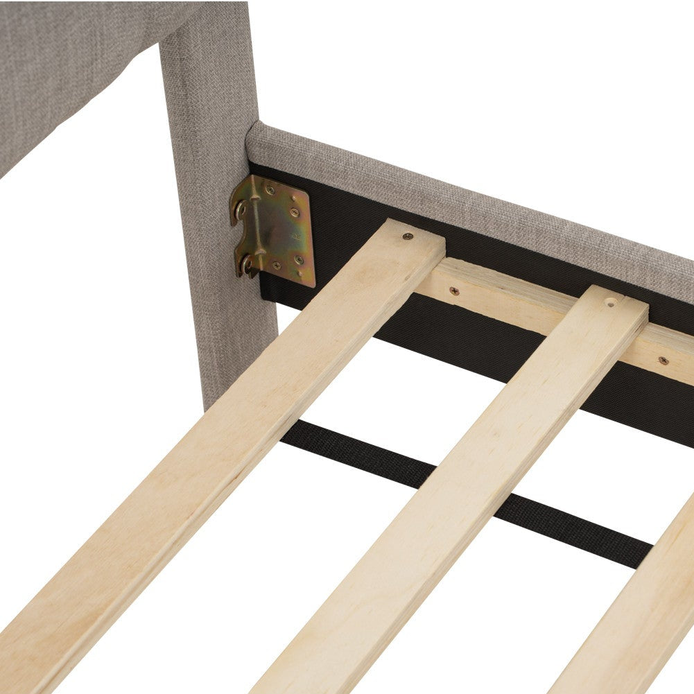 Wooden slats on a bed frame with a white background