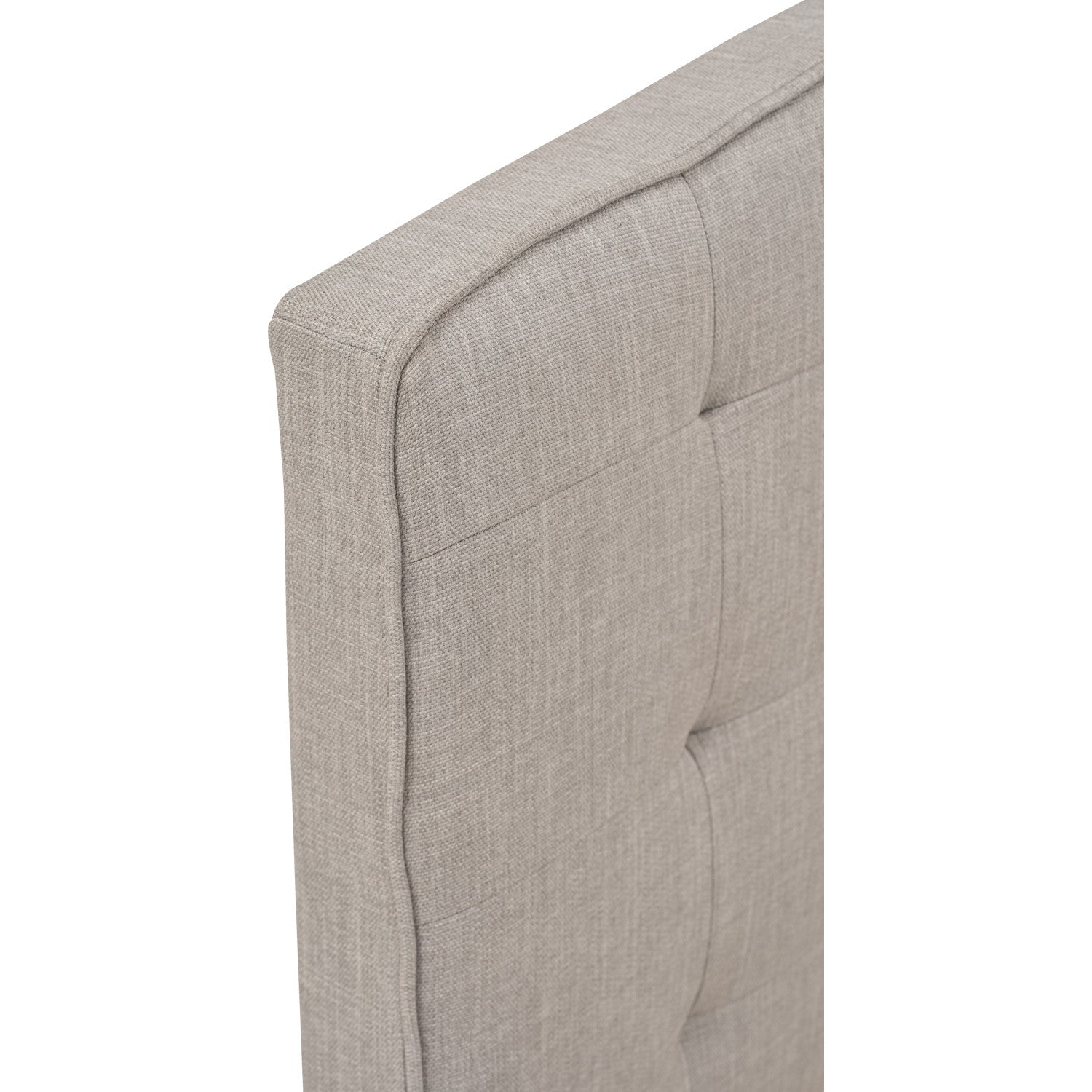 Close-up of a textured headboard on a white background