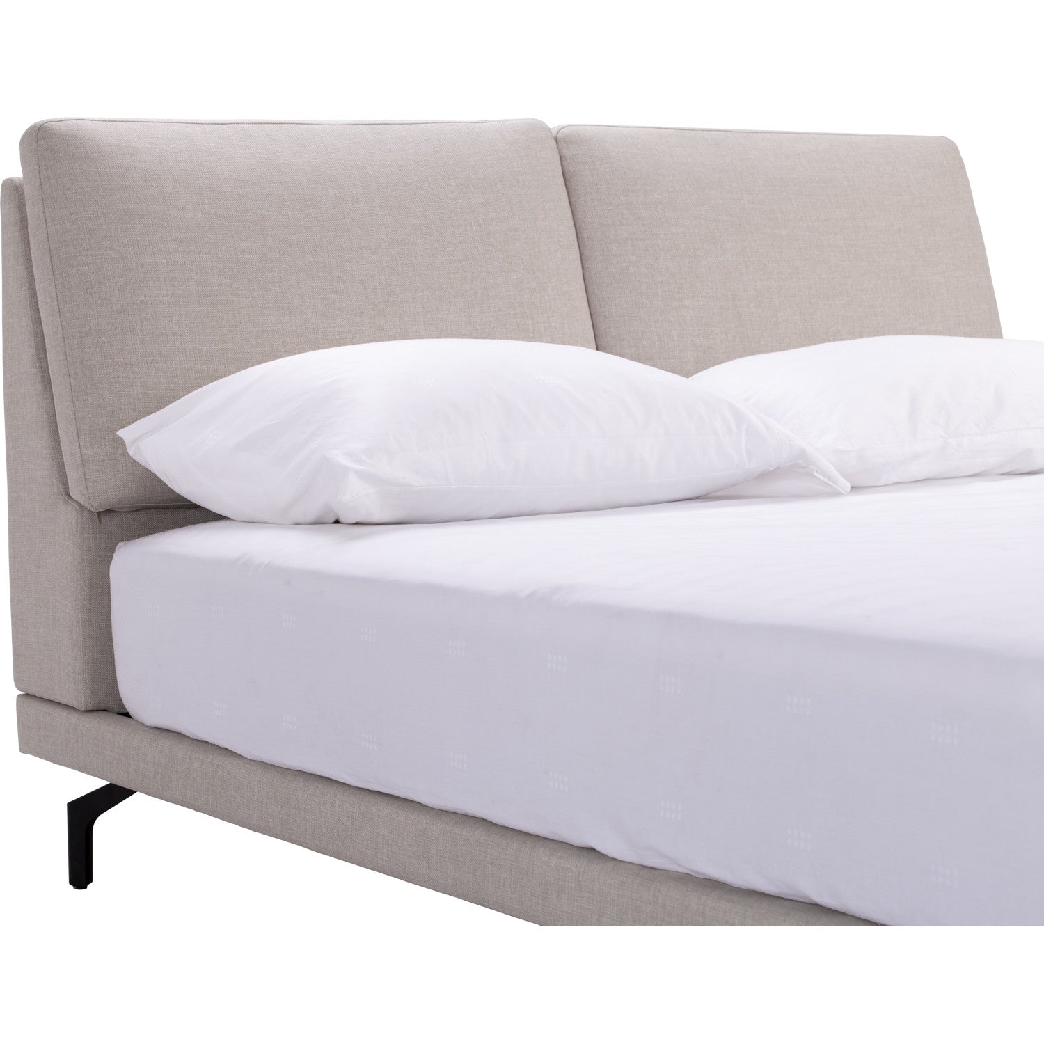 Gray upholstered bed with white bedding on a white background