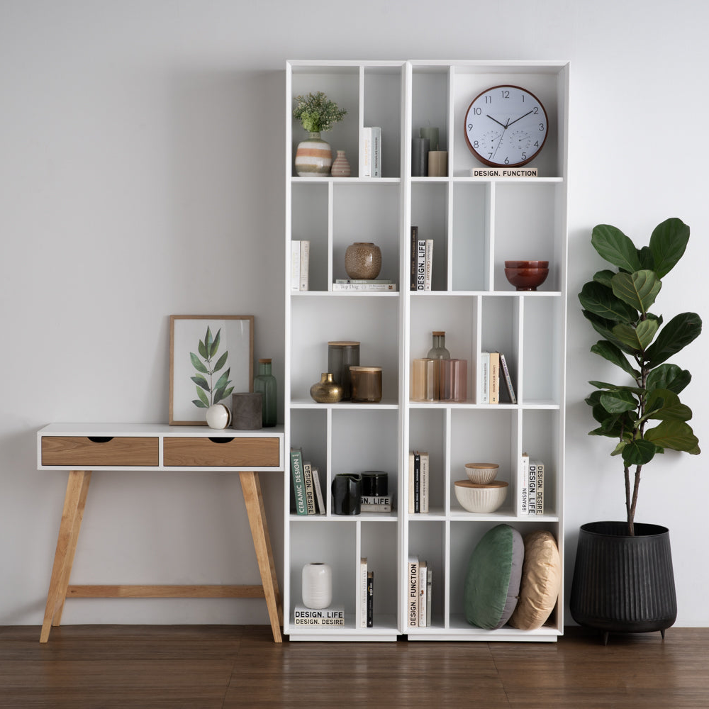 A black high bookcase with multiple shelves, designed for storage of books and display items.