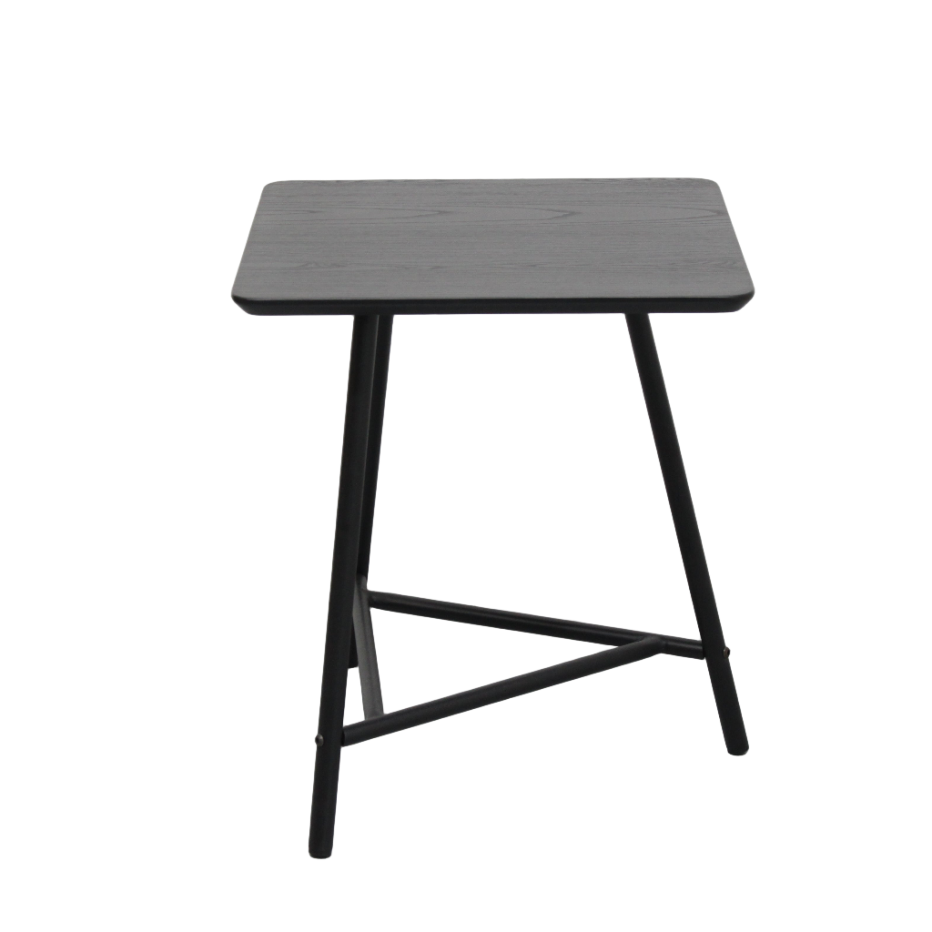 Black metal stool on a white floor with a white wall background