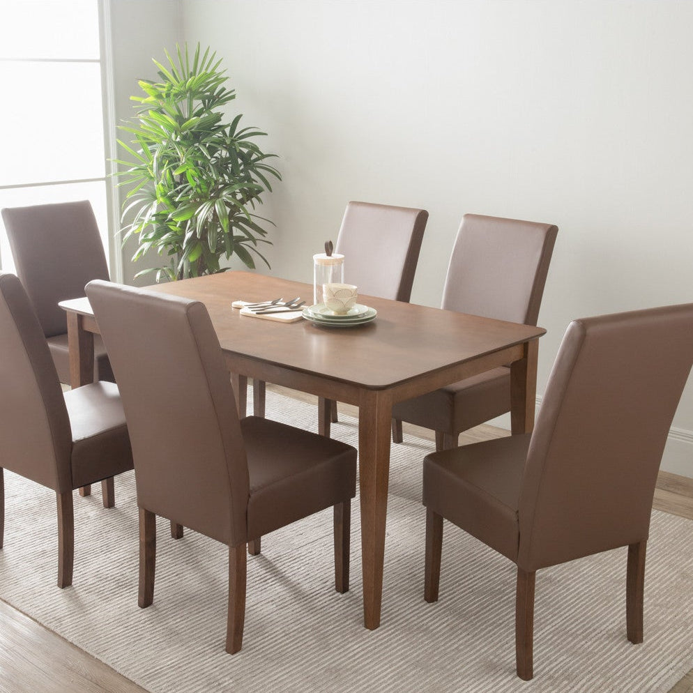 Dining room set with a wooden table and brown chairs in a well-lit room.