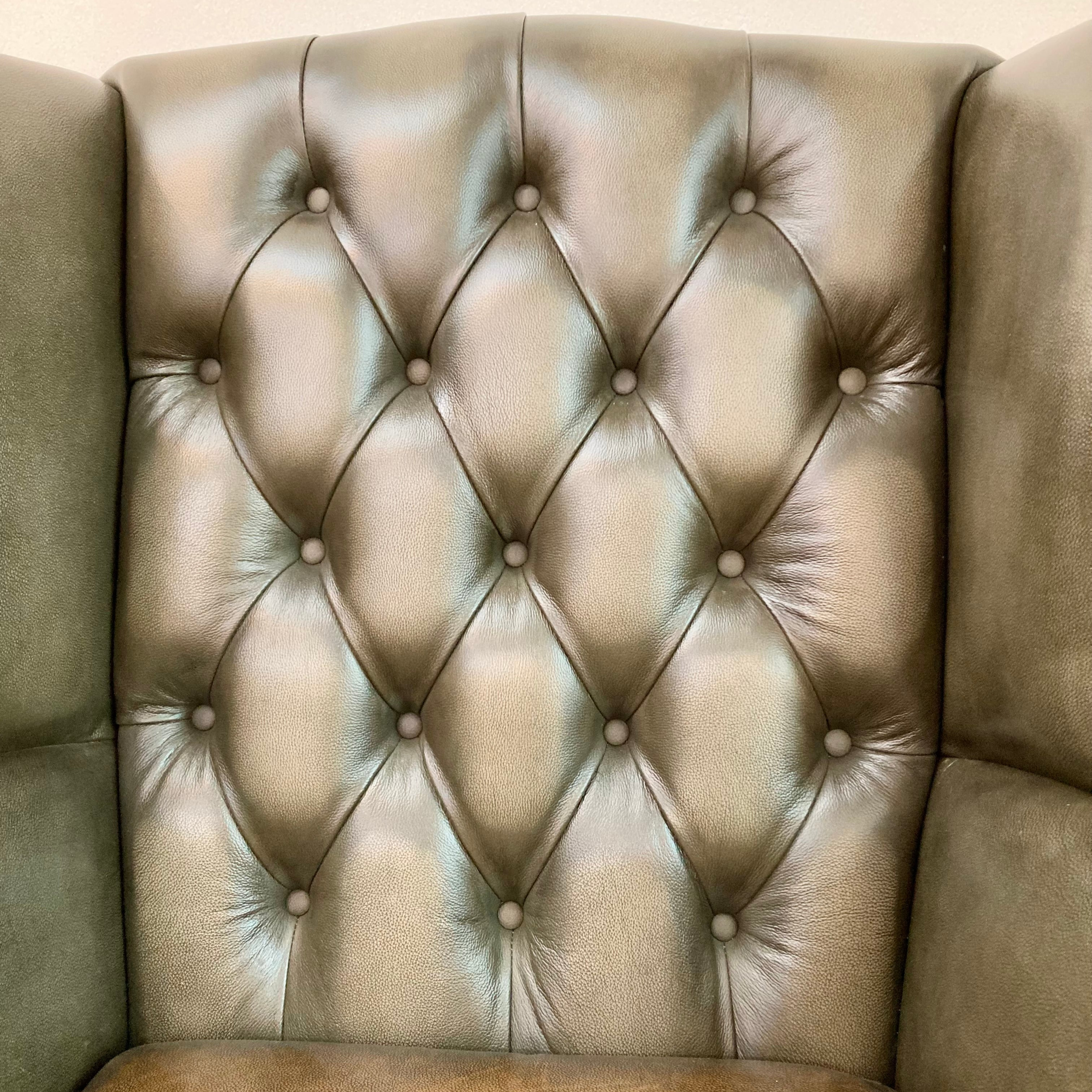 Beige armchair with tufted backrest on a beige background