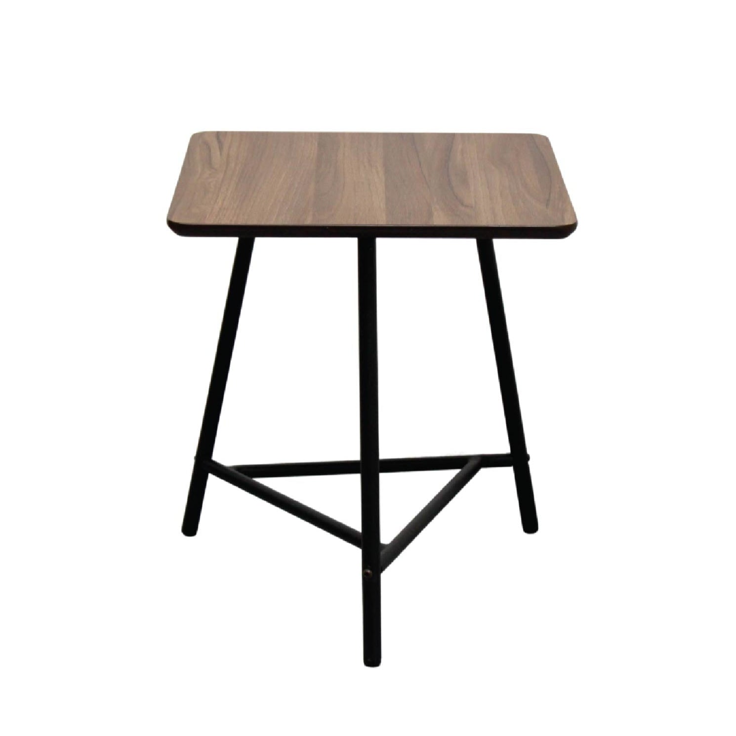 Small wooden table with black metal legs on a white background