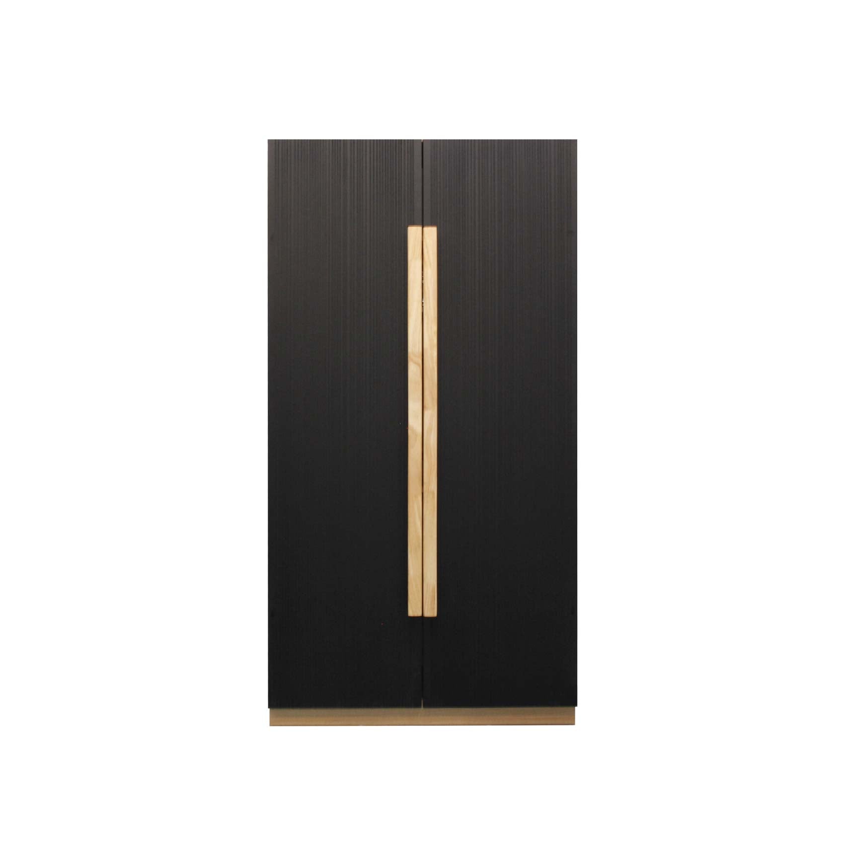 A modern cabinet with black doors and a solid wood handle, placed in a room next to a bed, with a painting on the wall above the cabinet.